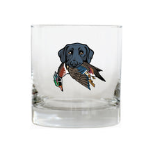 |Black Lab with a Wood Duck