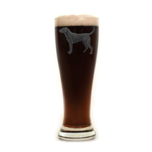 Load image into Gallery viewer, black lab pilsner glass full of beer
