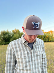 black lab hat in brown/tan, worn by a man